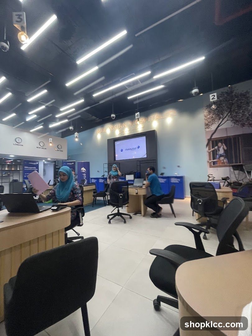 Office interior with staff and signage