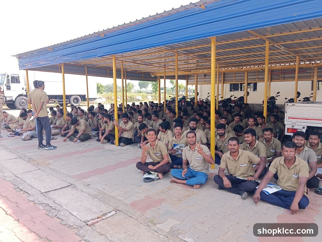 Group of men sitting under a covered area