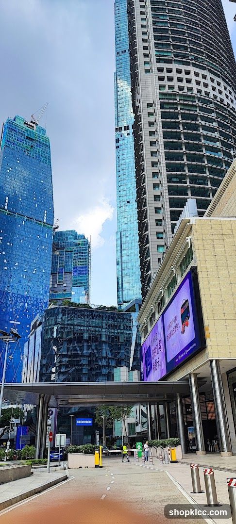 Modern Cityscape with Tall Buildings and Digital Billboard