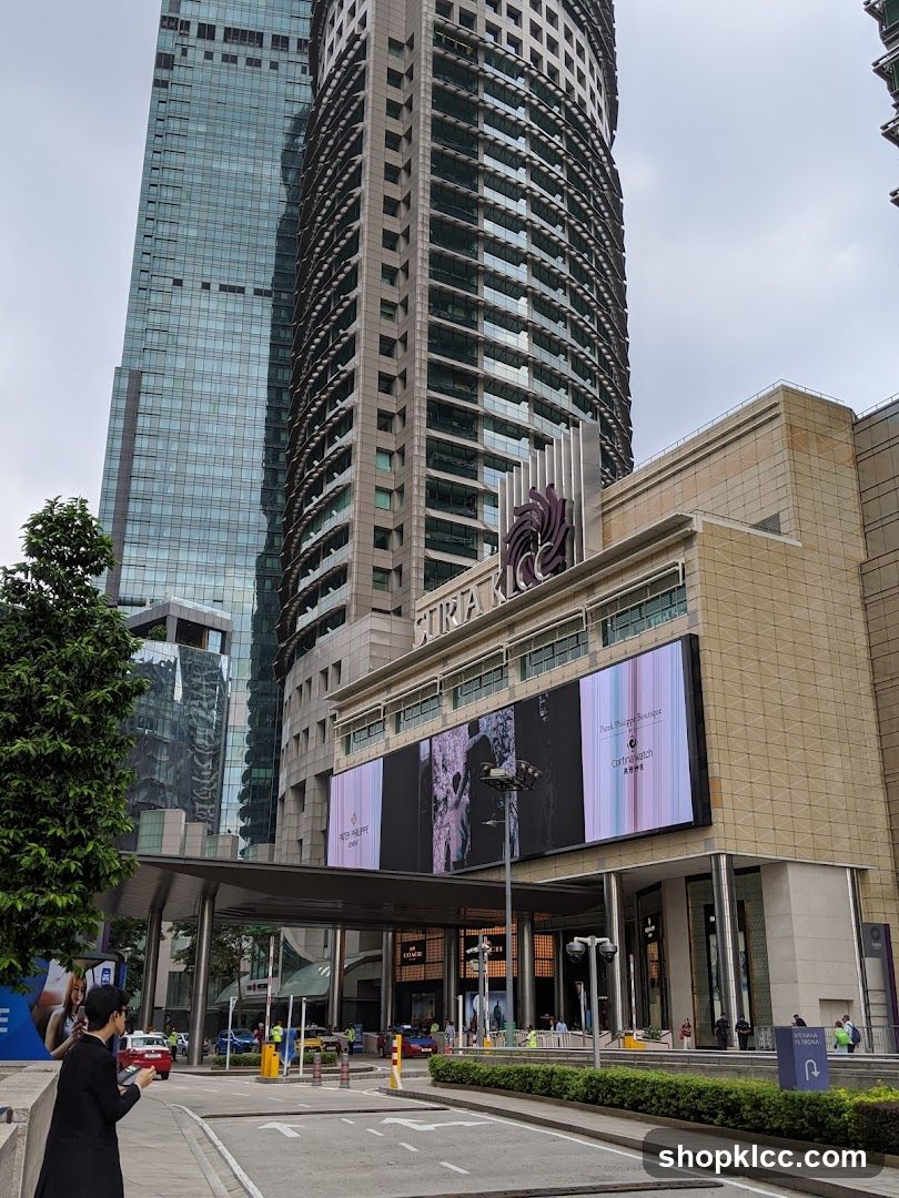 Modern Cityscape with Tall Buildings and Digital Billboards