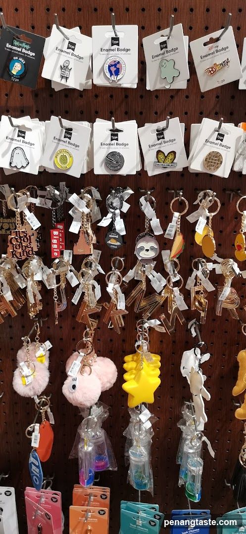 Assortment of Enamel Badges and Keychains