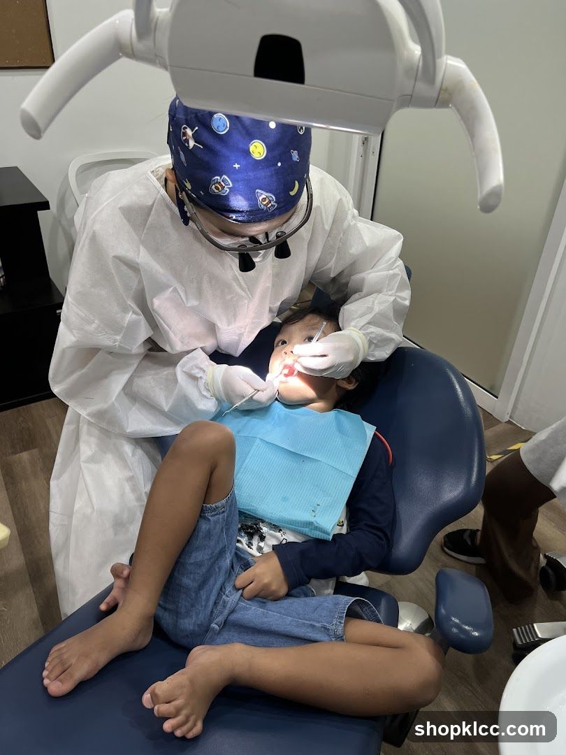 Dentist examining a child's teeth