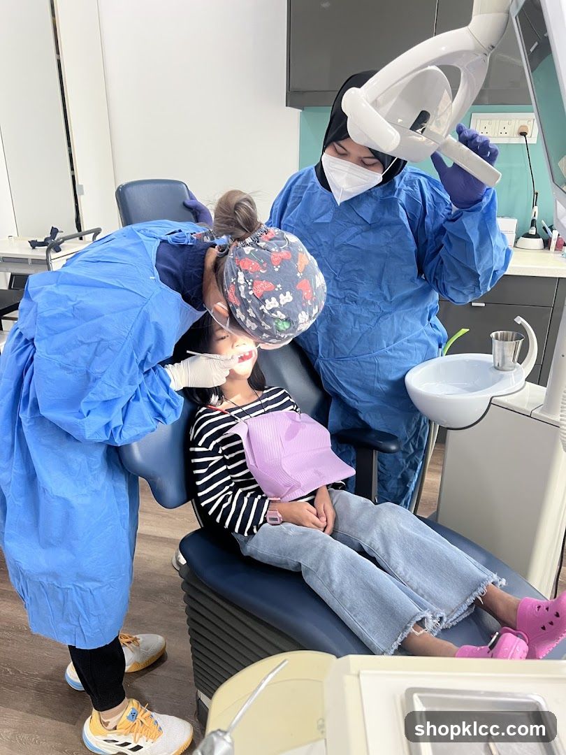 Dentist examining a child's teeth
