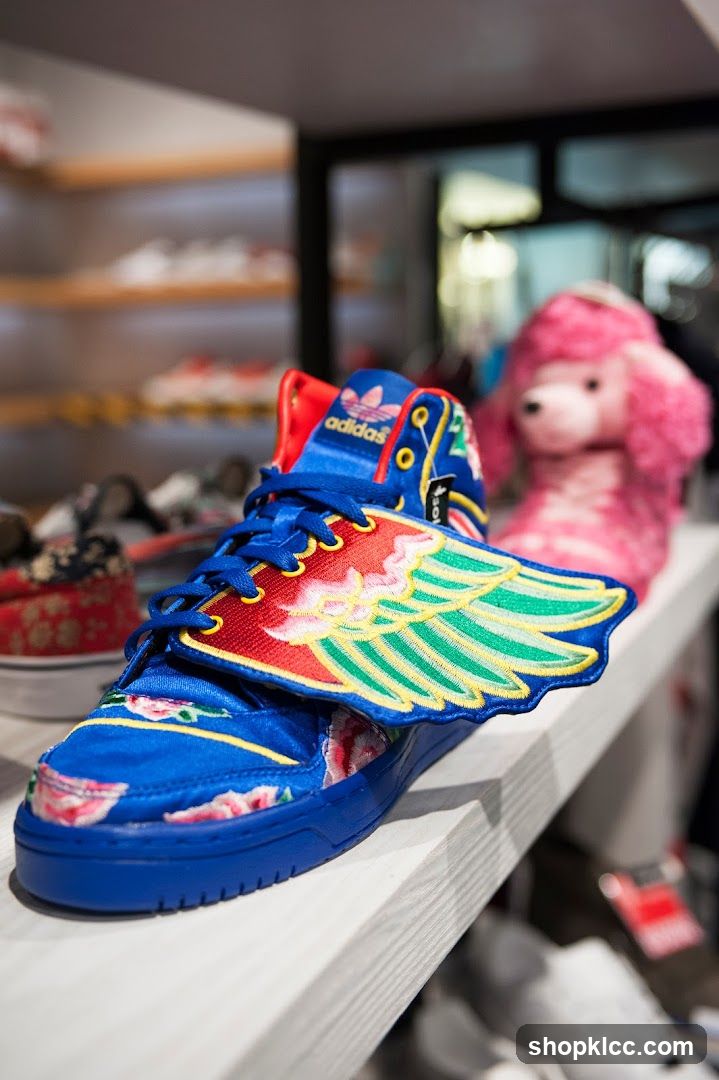 Adidas High-Top Sneakers with Wing Detail