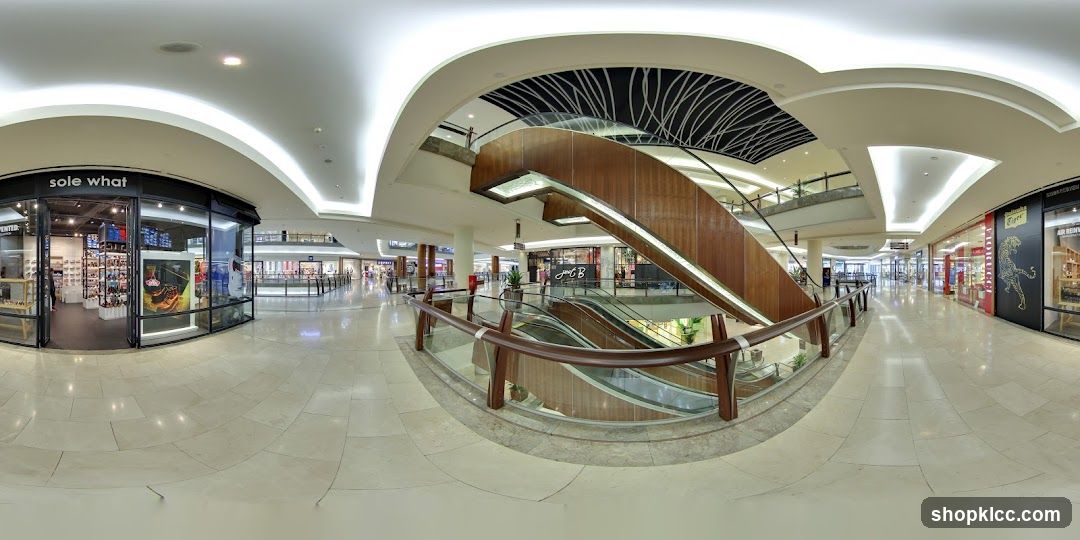 Mall Interior with Escalators and Shops