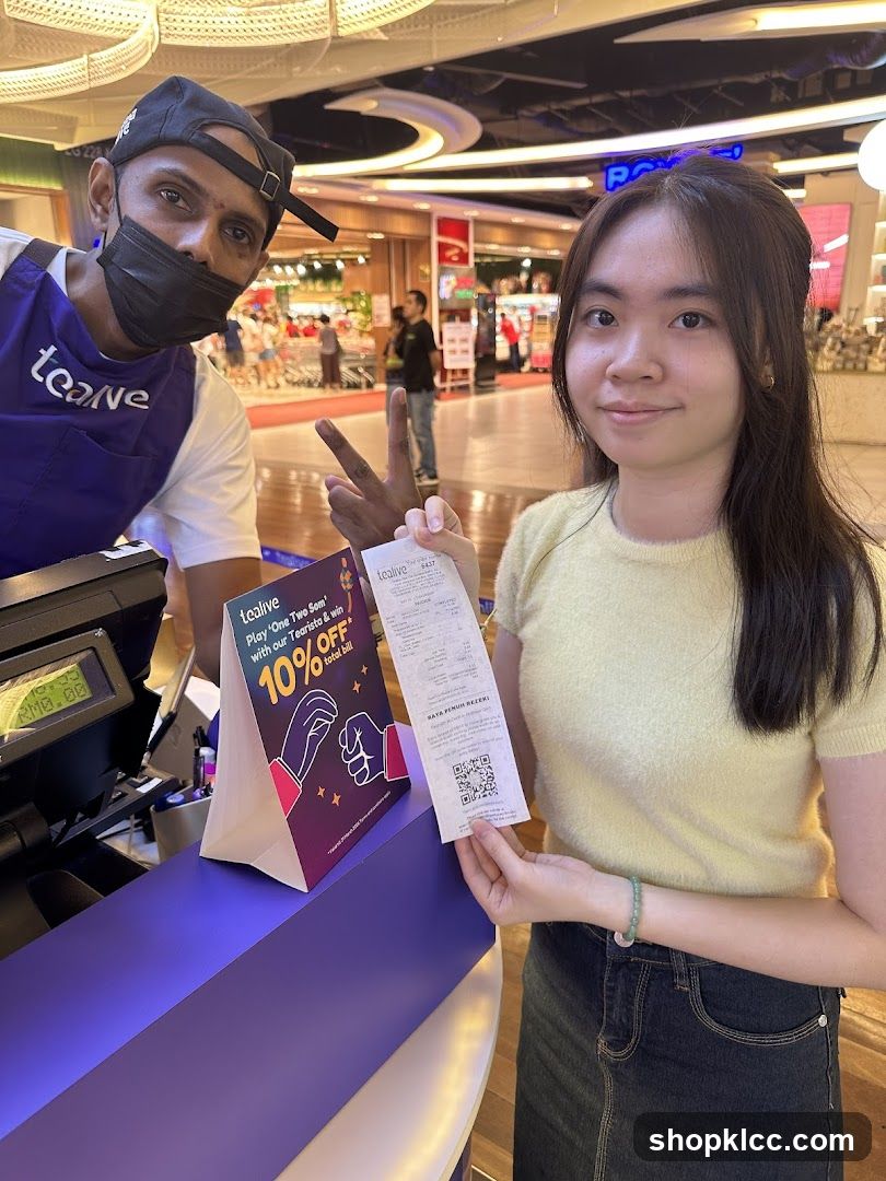 Customer and Staff at a Tealive Counter