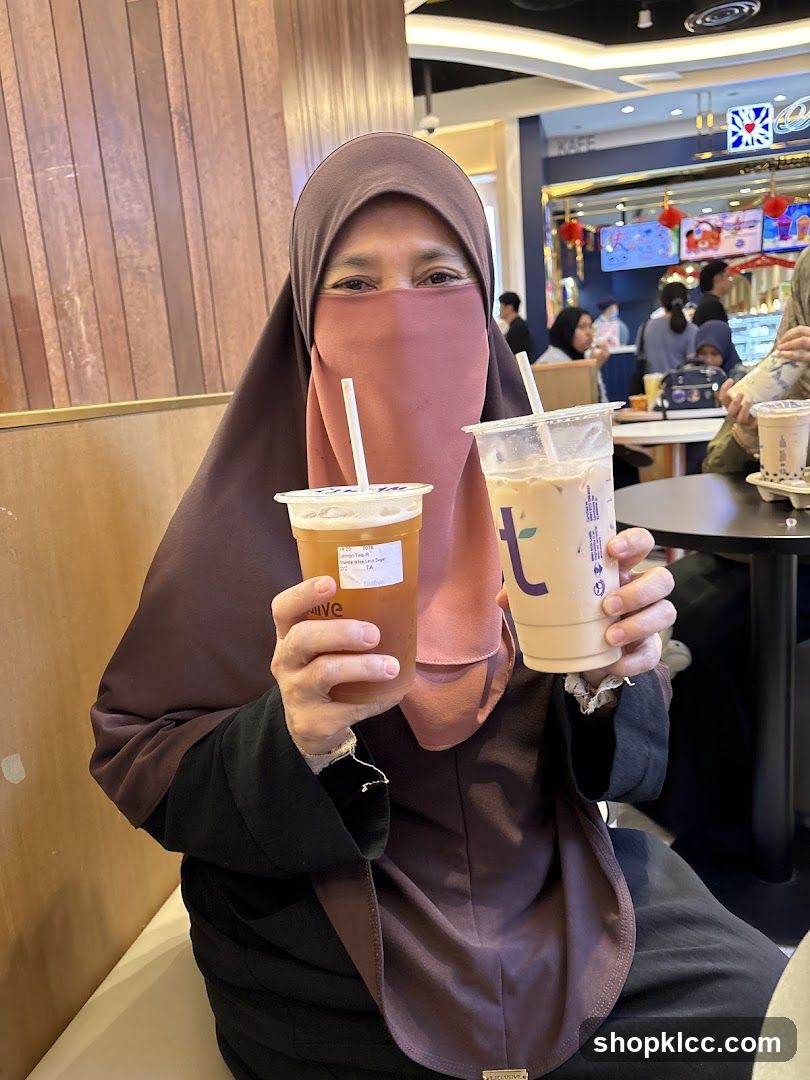 Woman Holding Drinks