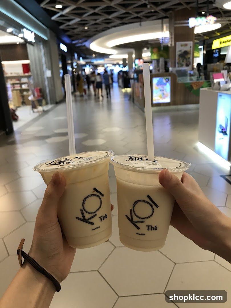 Two KOI Thé drinks
