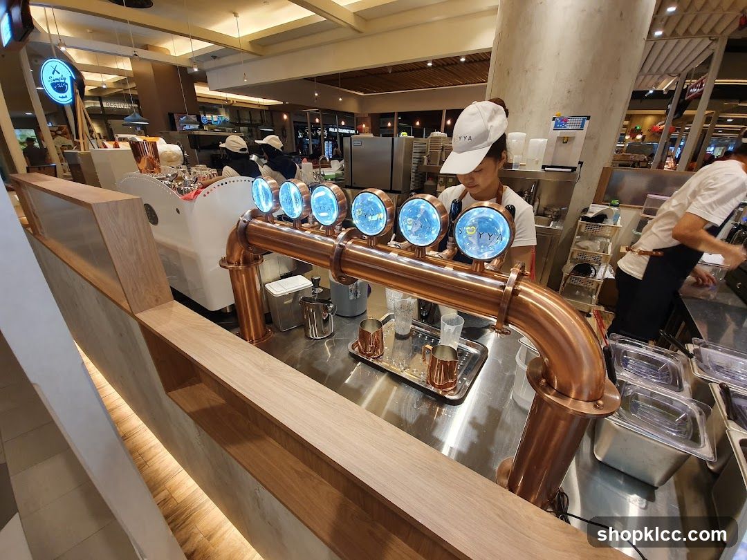 Barista preparing drinks at a counter