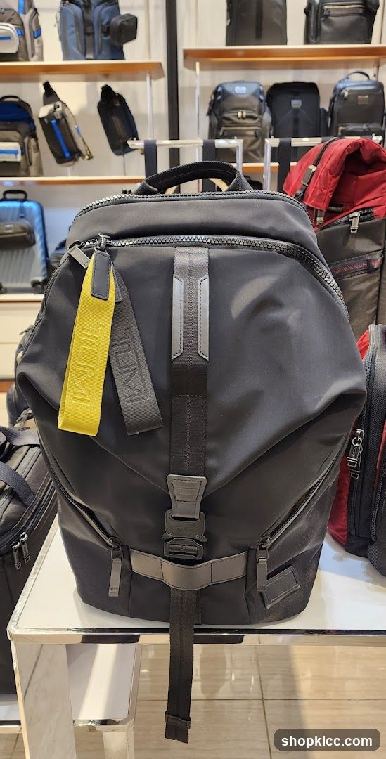Black Backpack with Yellow Tag