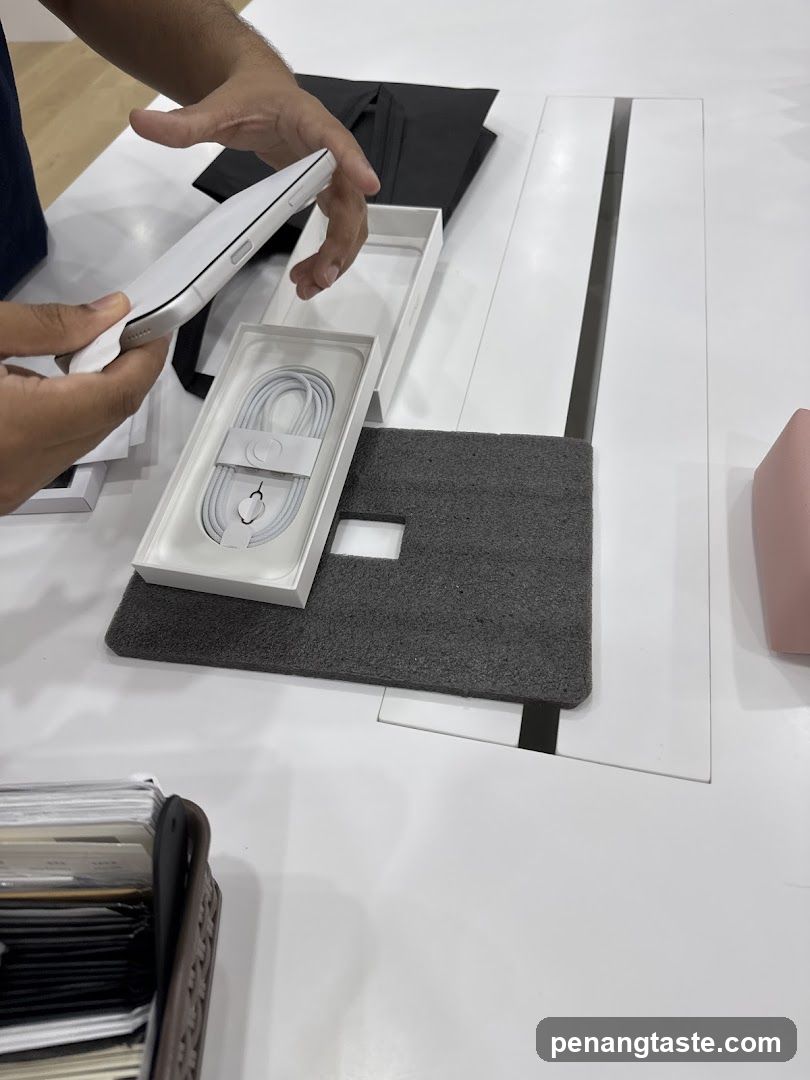 Unboxing a white smartphone