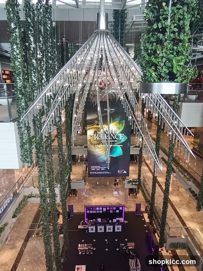 Indoor Atrium with Hanging Chandelier and Greenery