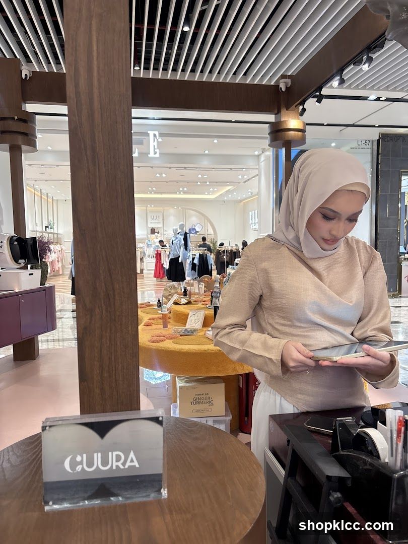 Woman holding a tablet in a store