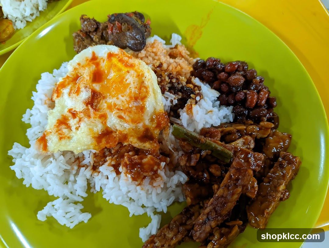 Plate of Rice with Various Toppings