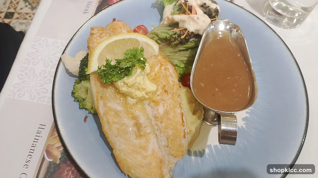 Fish dish with salad and sauce