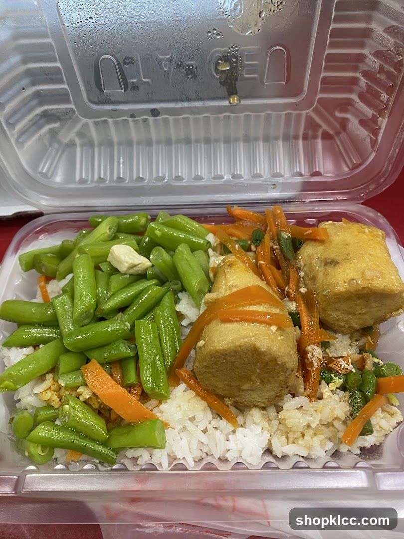 Takeout Meal with Rice, Green Beans, Carrots, and Tofu
