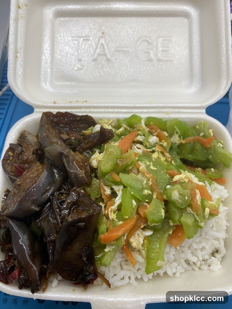 Takeout Container with Rice and Two Dishes