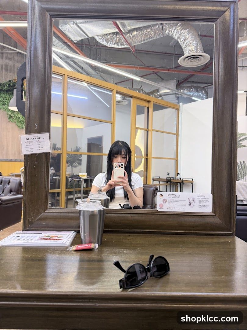 Woman taking a selfie in a mirror
