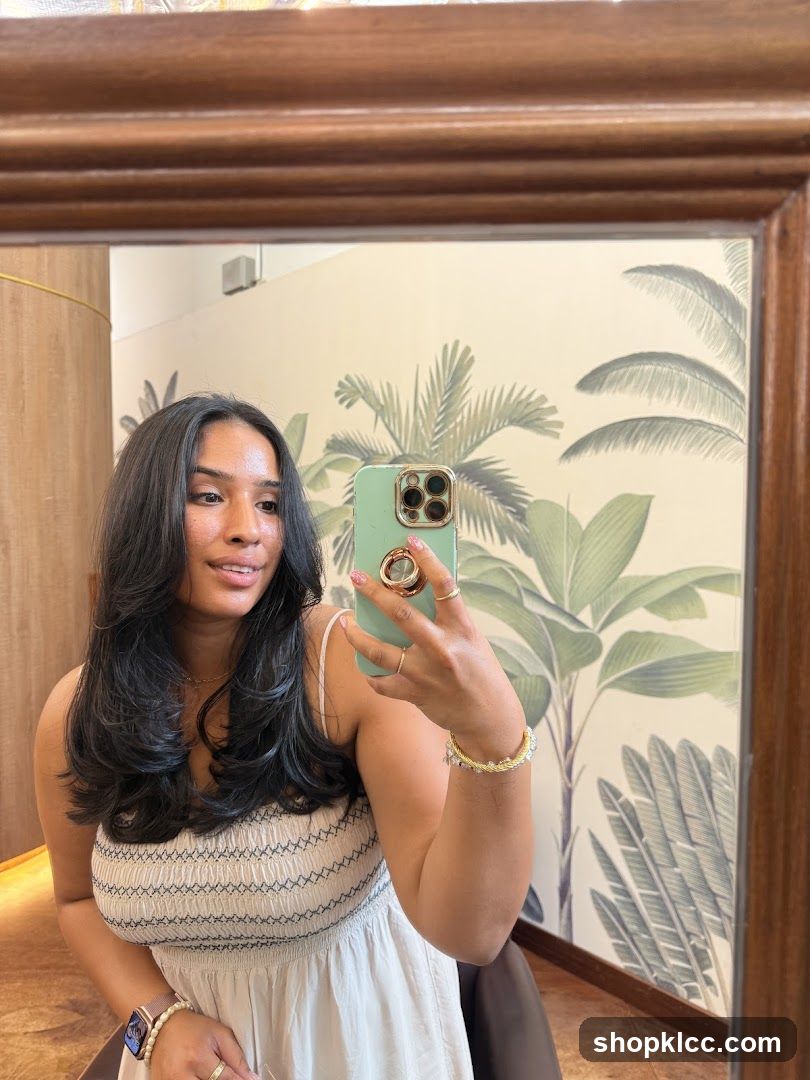 Woman taking a mirror selfie
