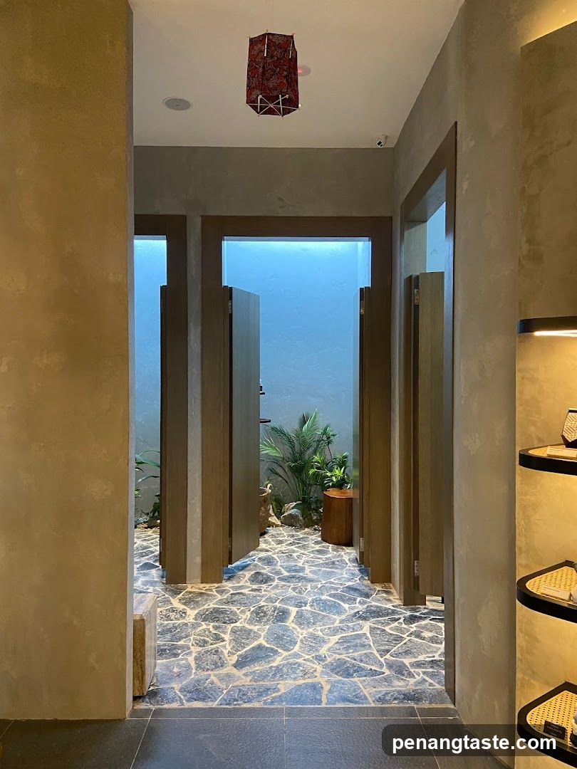 Interior hallway with doors and plants