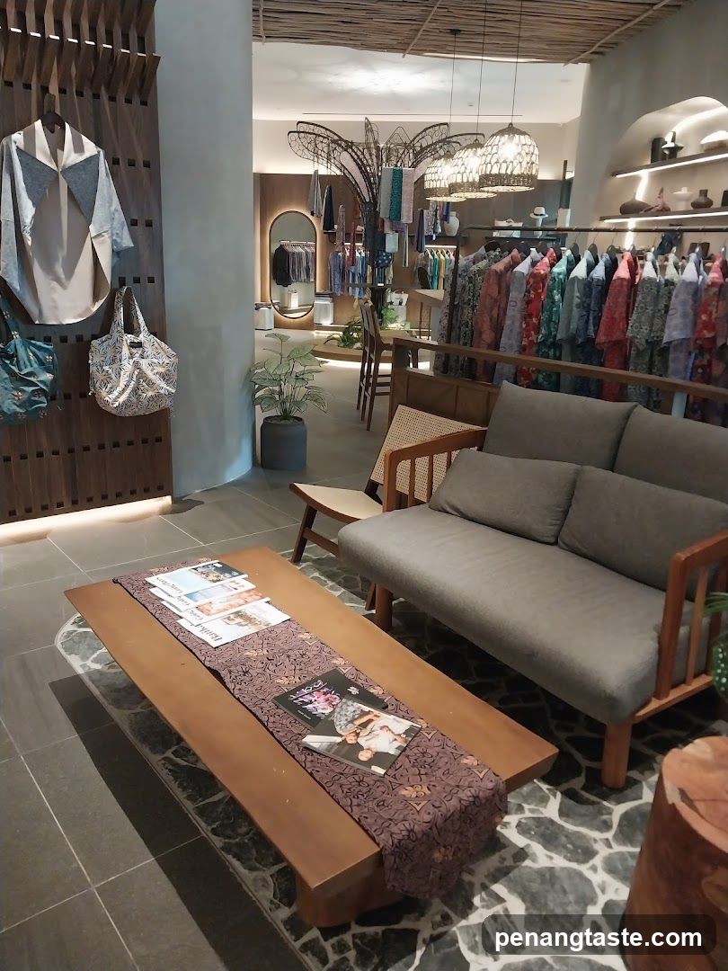 Clothing store interior with seating area