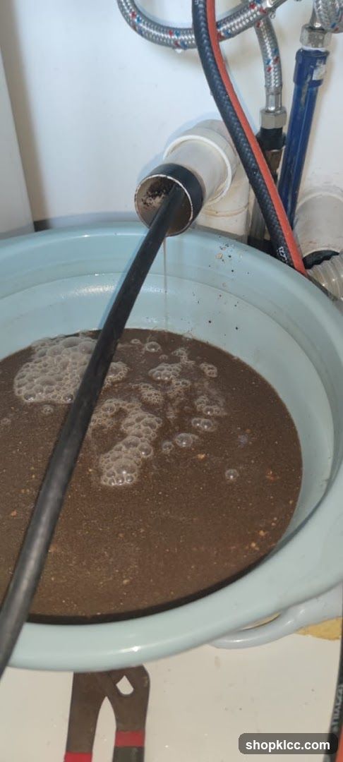 Drain Cleaning with Brown Sludge