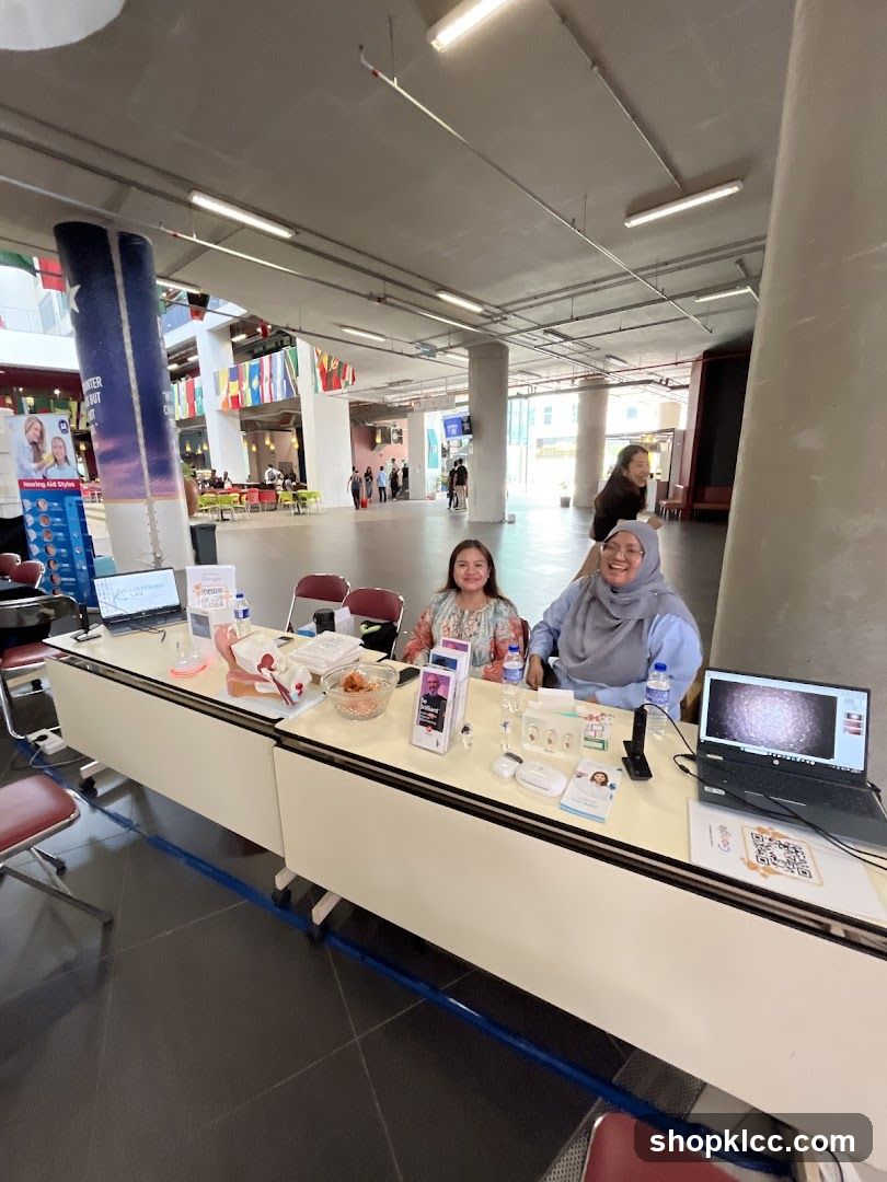 Indoor Event Setup with Staff at Desk