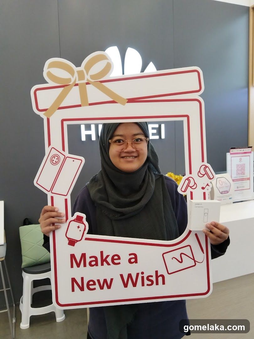 Person Holding Promotional Cutout