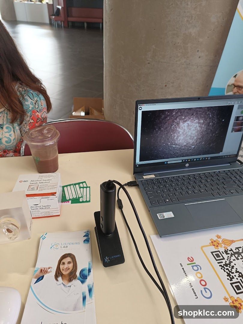 Table with laptop and alcohol wipes
