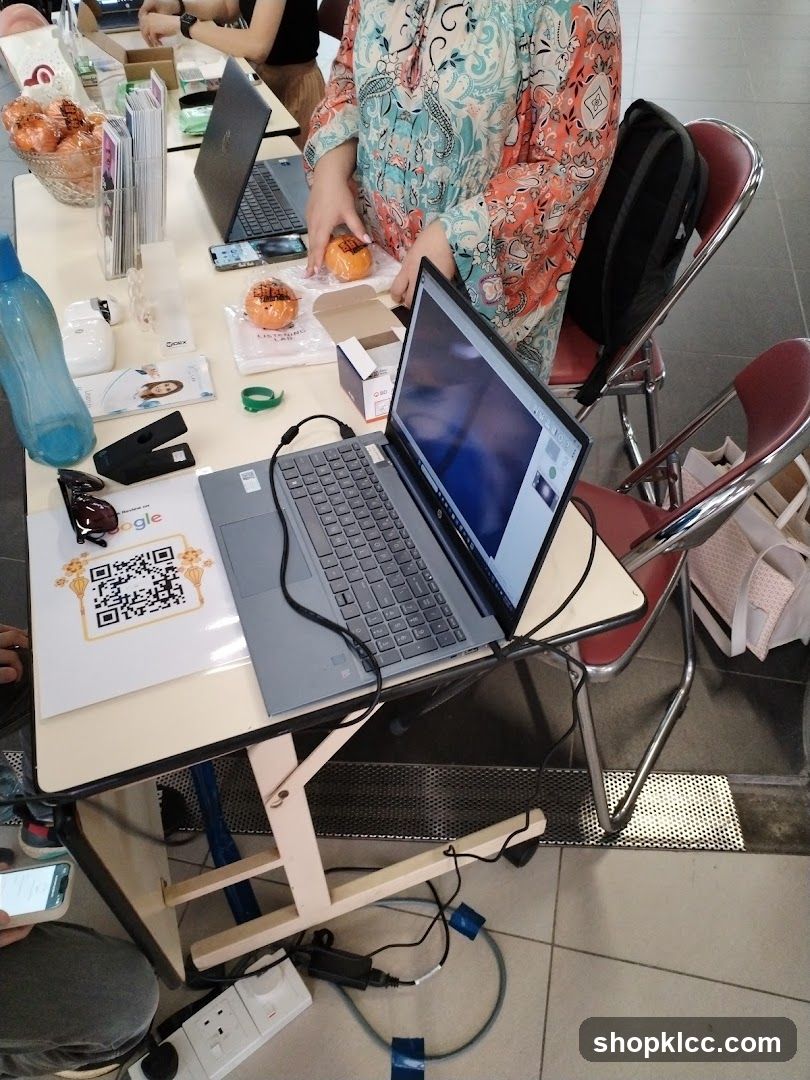Workstation Setup with Donuts and Laptops