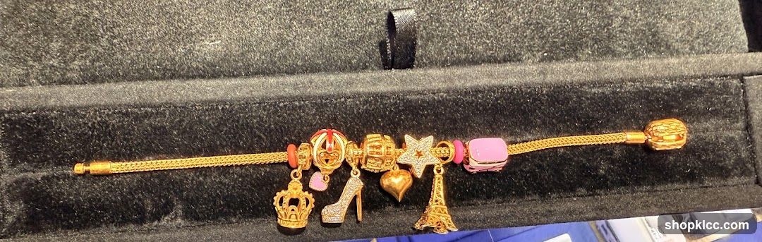 Gold Bracelet with Charms