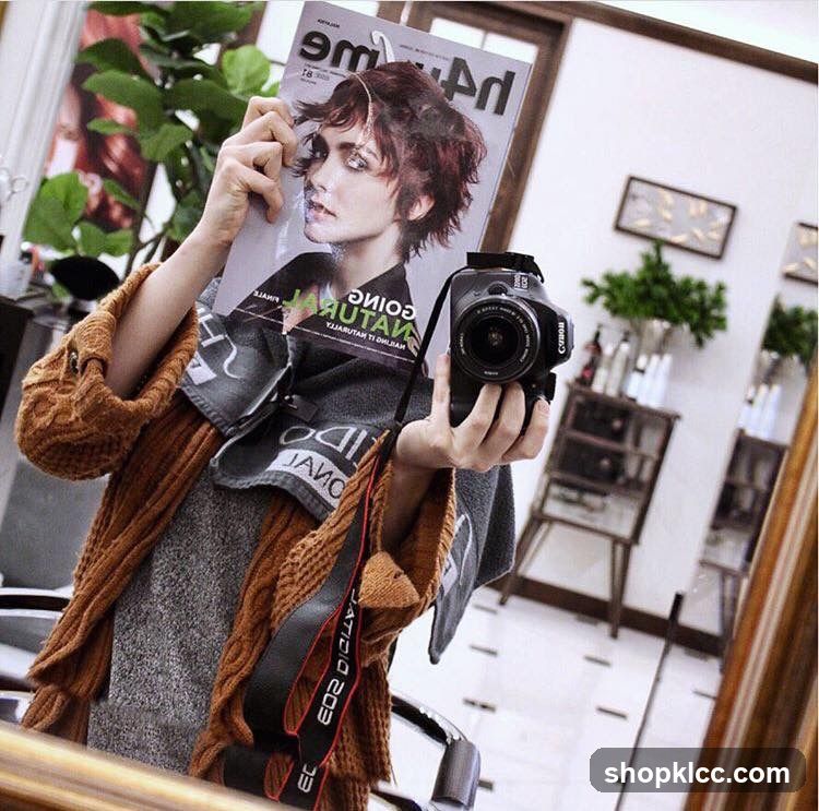 Magazine and Camera Reflection