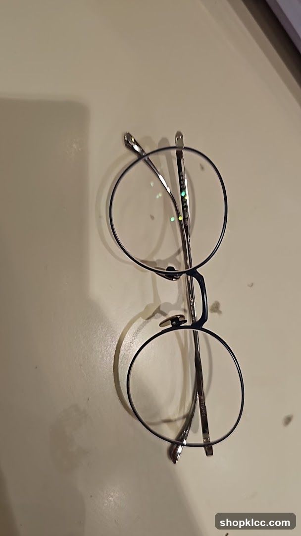 Round Eyeglasses on Surface