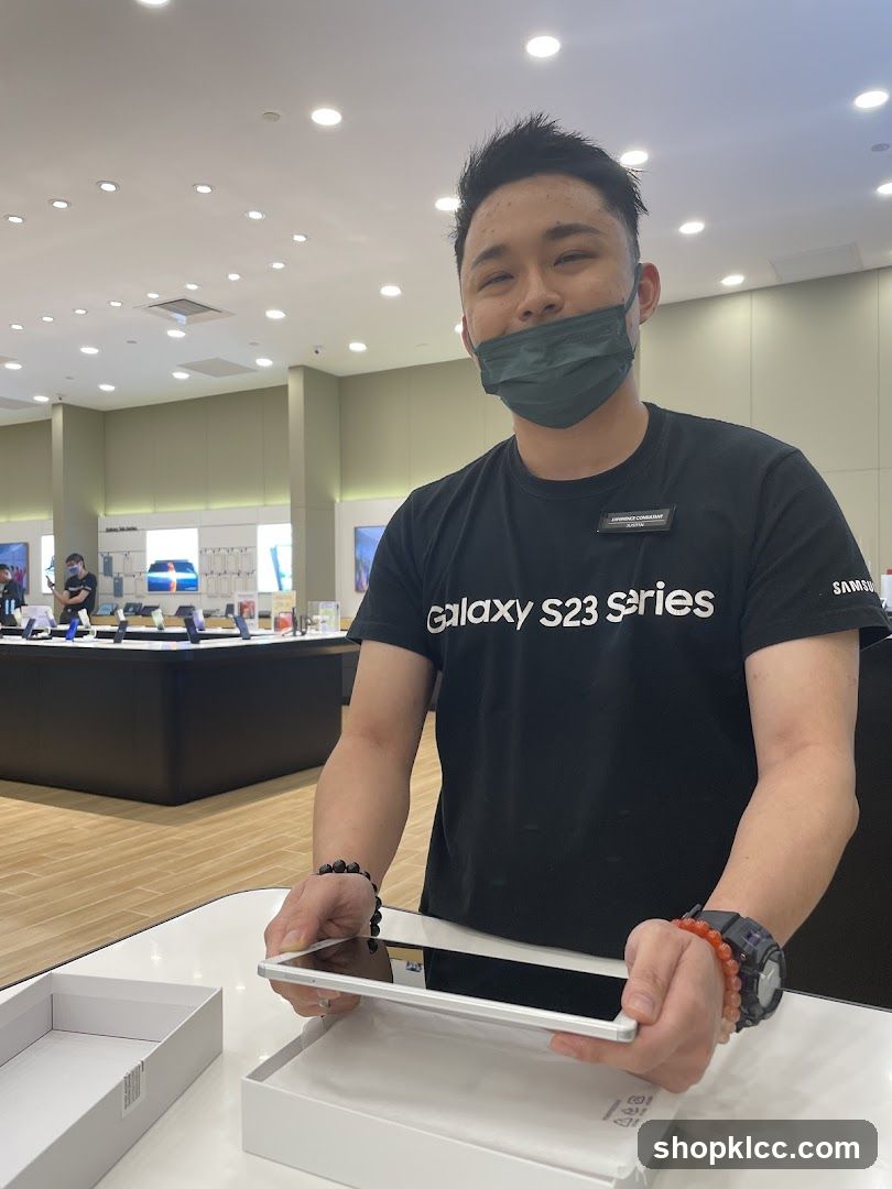 Salesperson with Tablet