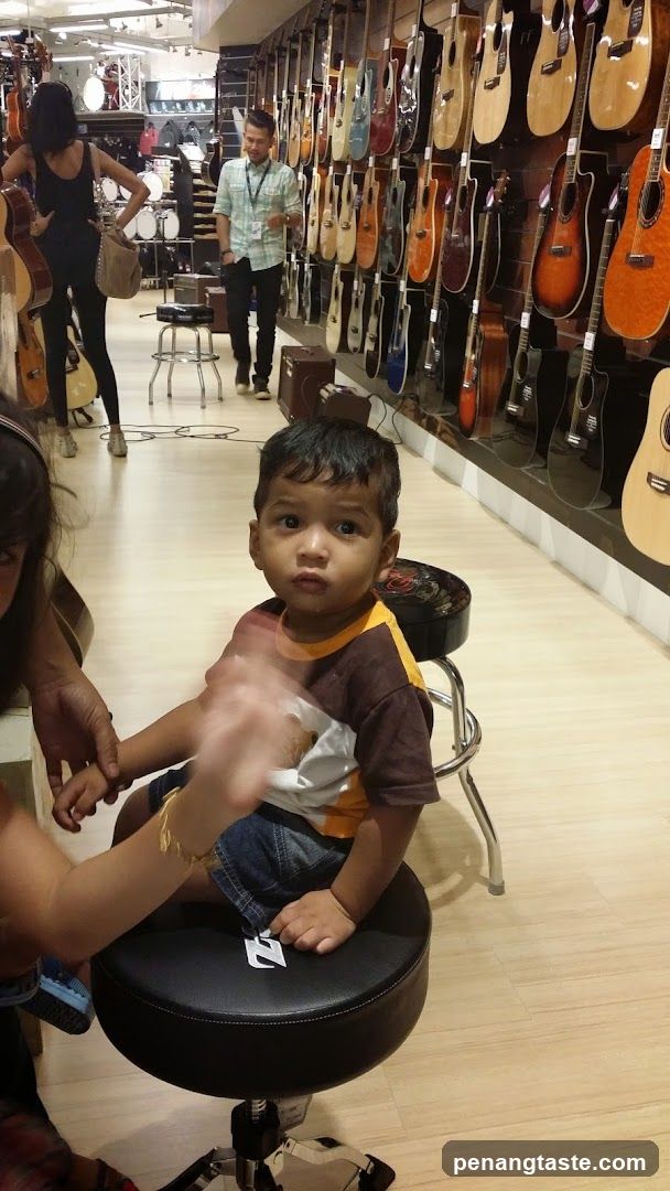 Child in a music store