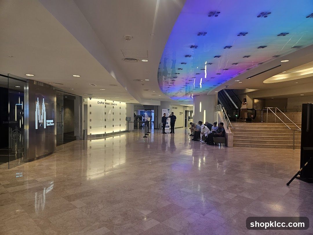 Modern Lobby with Colorful Ceiling and Seating Area