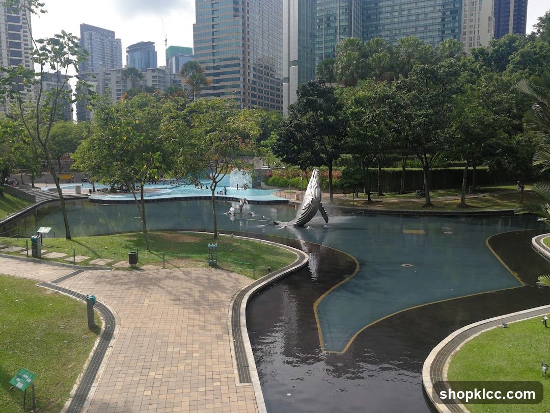 Park with Whale Sculpture and City Skyline