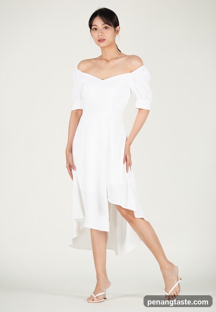 Woman in White Off-the-Shoulder Dress