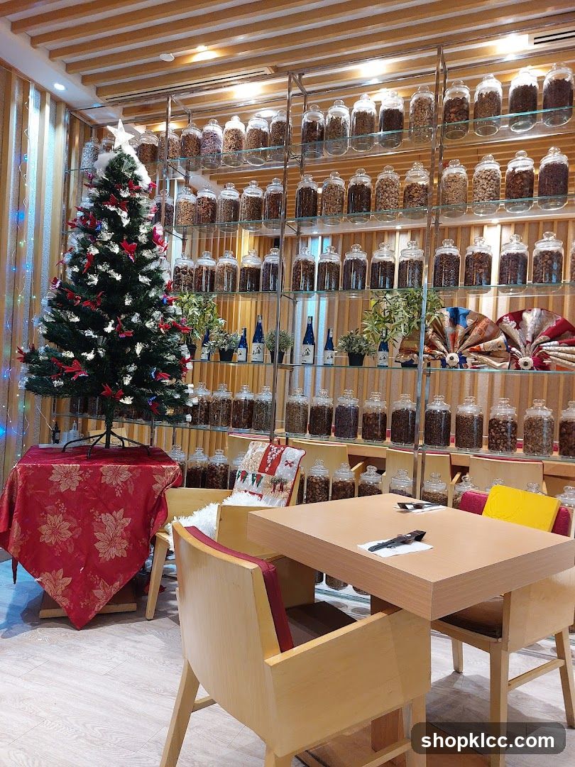 Interior of a shop with a Christmas tree and jars of ingredients
