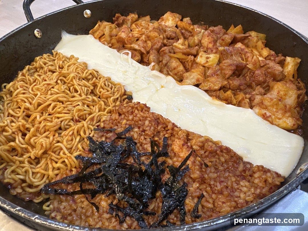 Spicy Stir-Fried Chicken with Cheese and Noodles