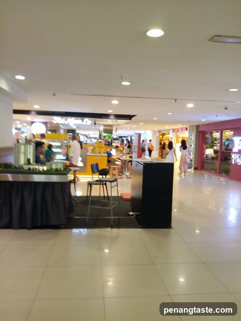Mall Interior with Shops and People