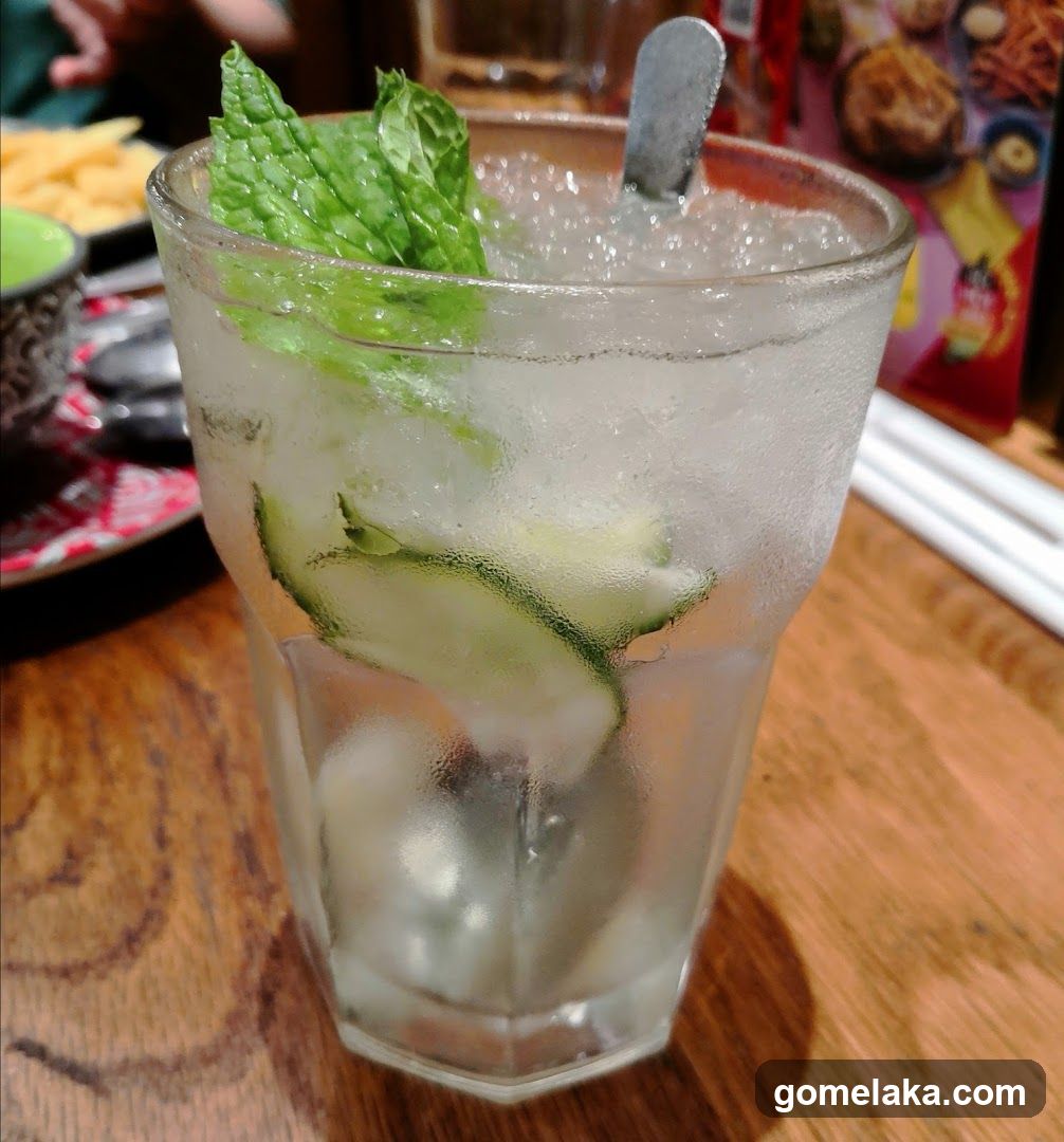 Cucumber Mint Drink on Wooden Table