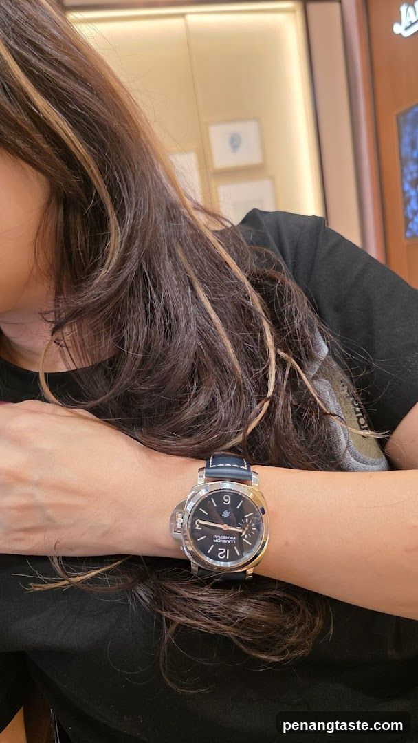 Woman wearing a Panerai Luminor watch