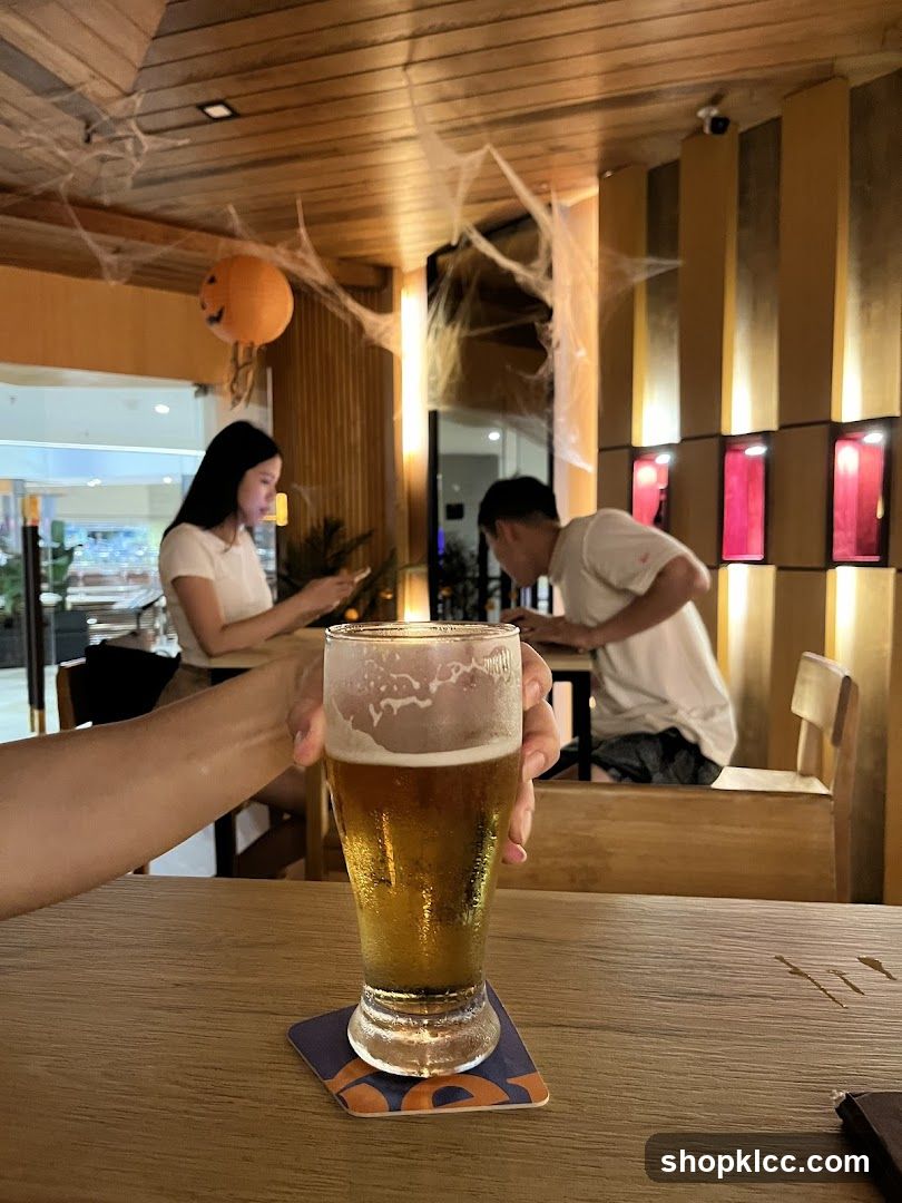 People at a bar with Halloween decorations