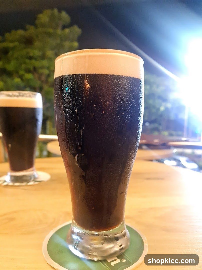 Two glasses of dark beer
