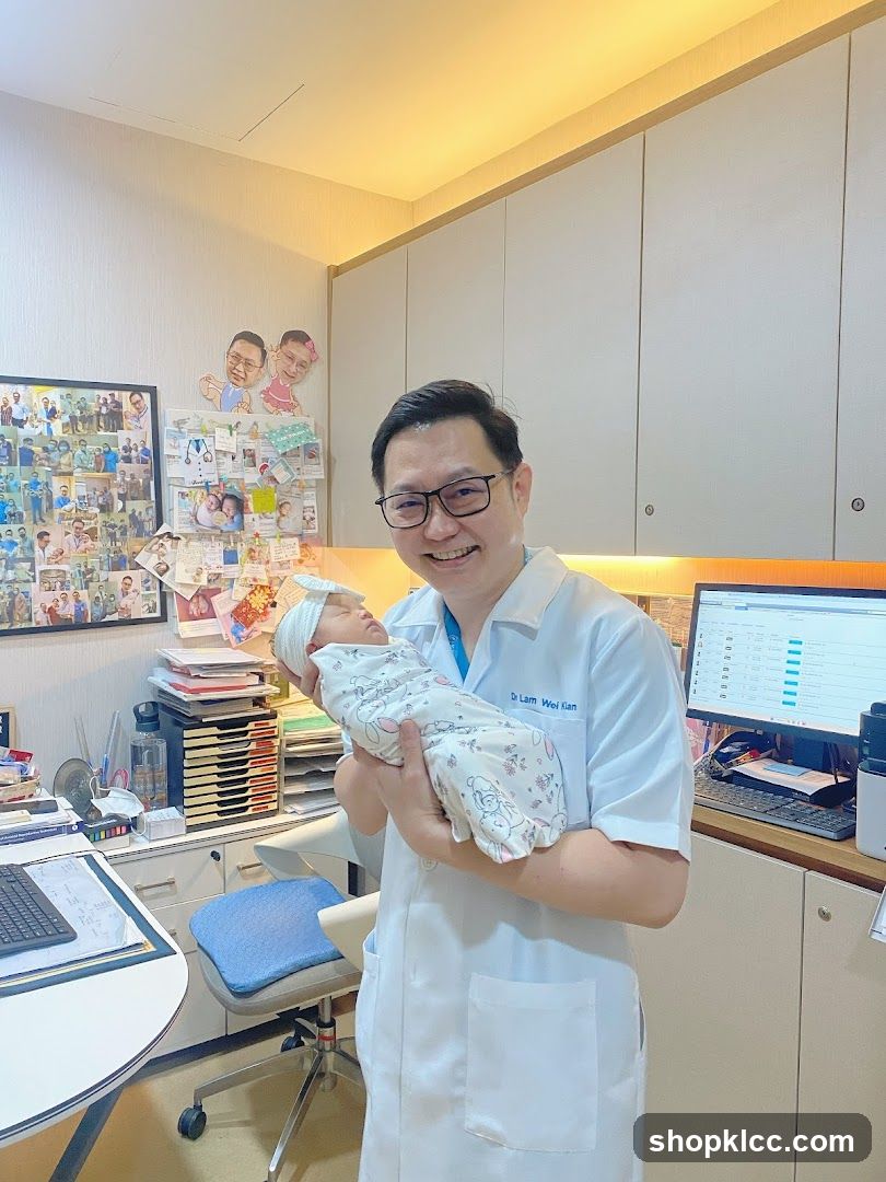 Doctor holding a newborn baby