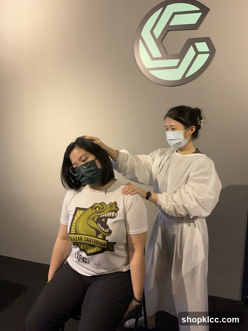 Therapist adjusting patient's neck
