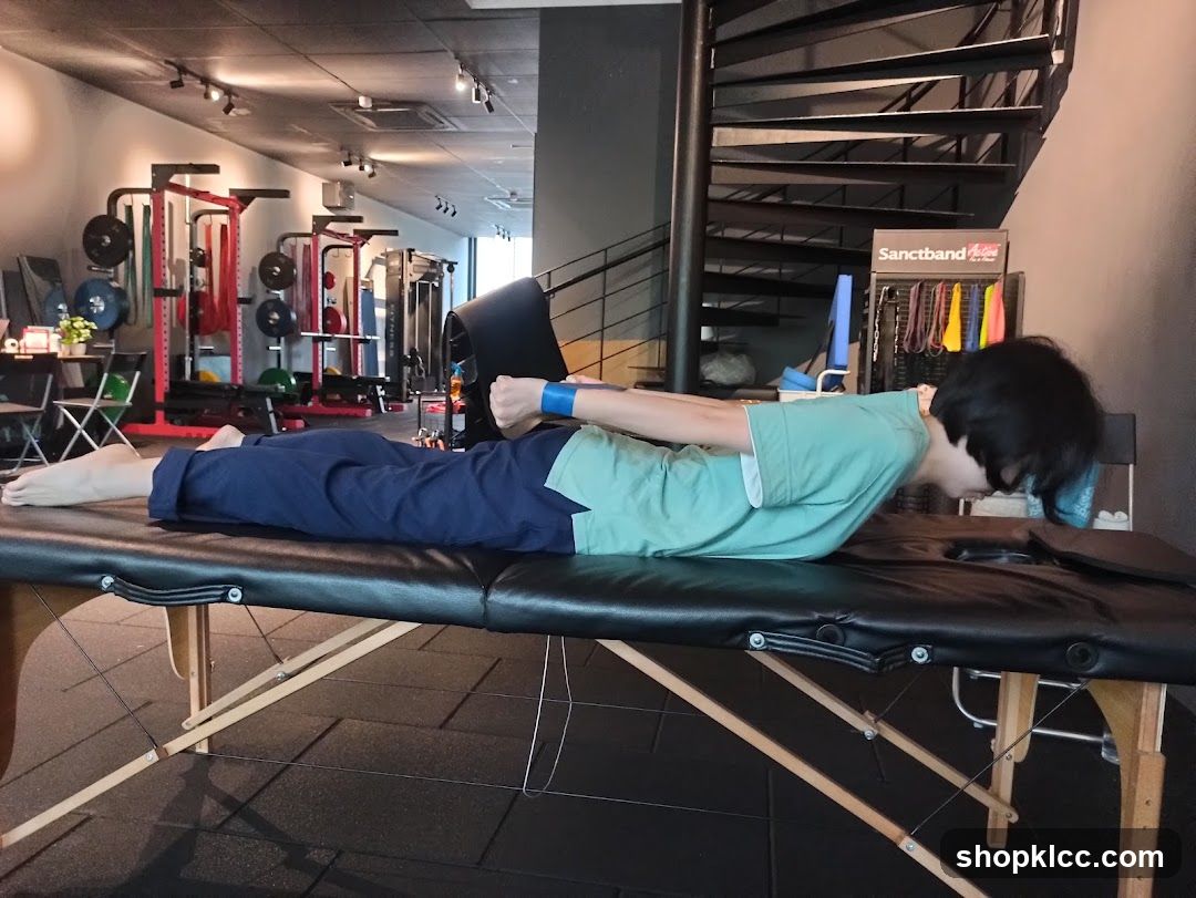 Person exercising on a massage table