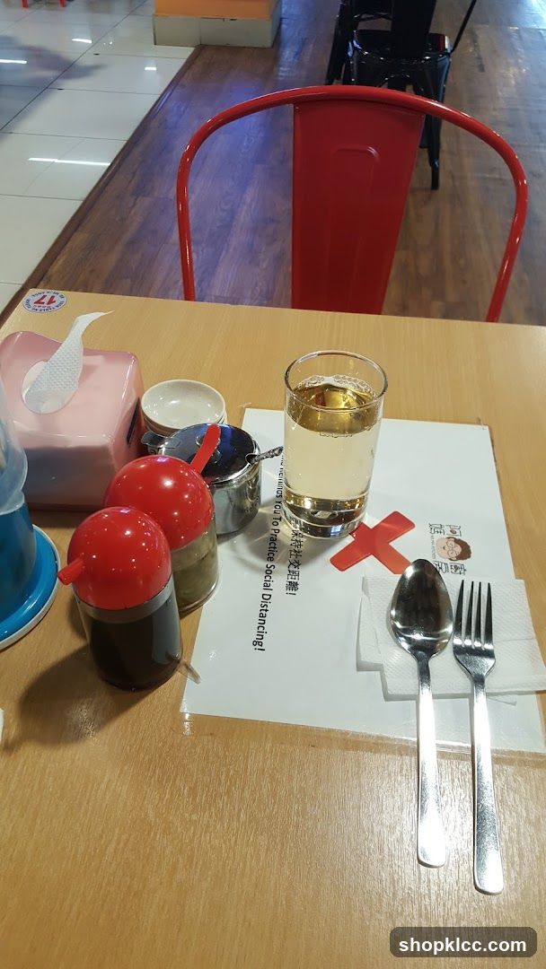Table Setting with Condiments and Drink