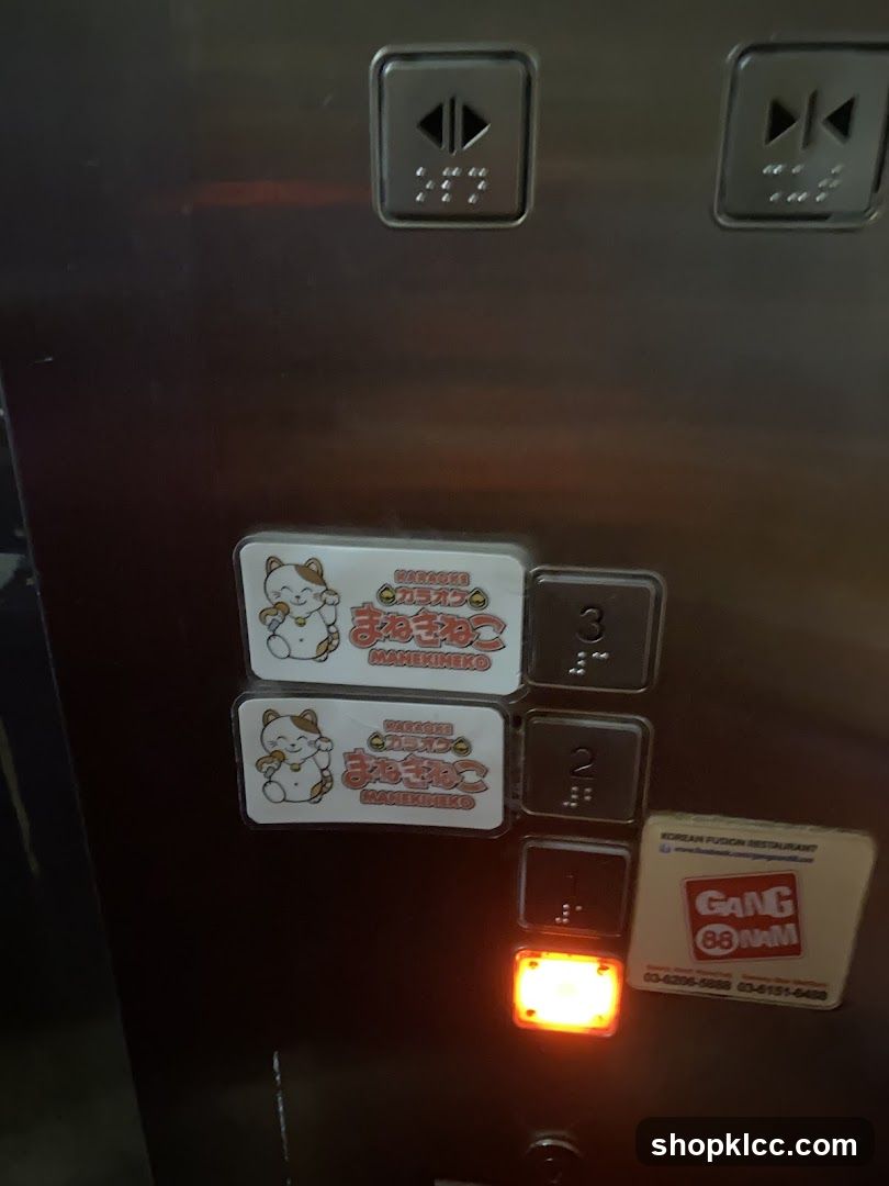 Elevator Buttons with Business Stickers